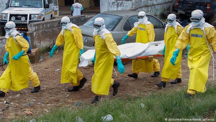 2014 Ebola outbreak burial team in Sierra Leone.