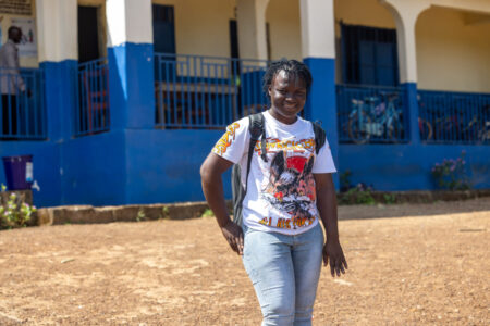 Students riding to an SfS partner school in Koromasalaia that Clinton Caulker helped build