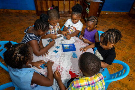 Children building the Aberdeen bridge puzzle