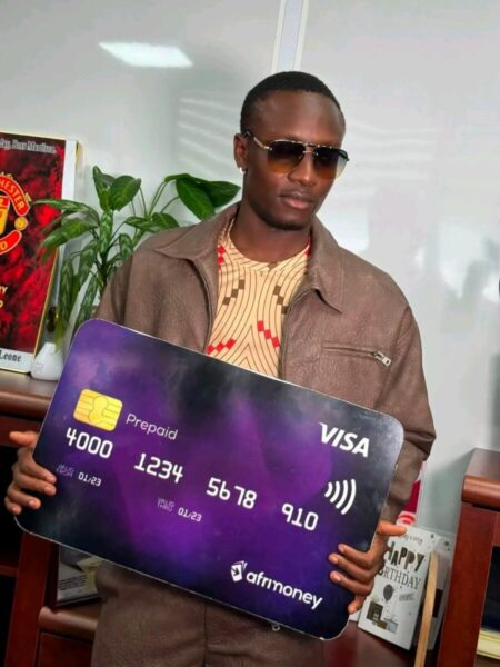 Drizilik holds the Afrimoney prepaid card by Africell