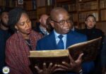 President Bio and First Lady Fatima Bio view the Mende Bible in Quincy, Massachusetts.