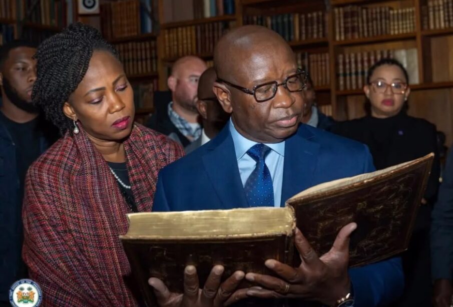 President Bio and First Lady Fatima Bio view the Mende Bible in Quincy, Massachusetts.