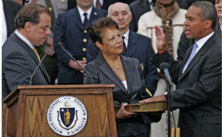 Massachusetts Governor Deval Patrick taking the oath of office on the 1841 Mendi Bible.
