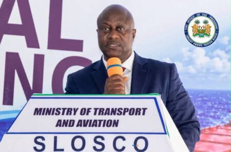 Ambassador Colonel (Rtd.) Alhaji Fanday Turay Minister Of Transport and Aviation Giving his speech during the launching