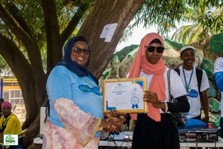Winner in Female Category for Walking, Fatmata Ramadan Jalloh receiving her certificate(Photo Credit: DAQVAH )